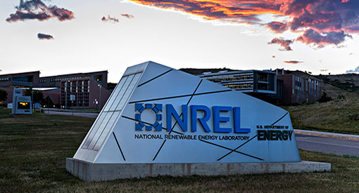 NREL campus sign during sunrise