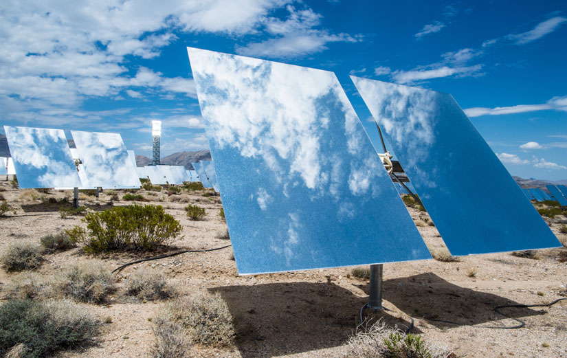 Heliostats stand in front of a solar tower at the Ivanpah concentrated solar power plant in Nipton, California.