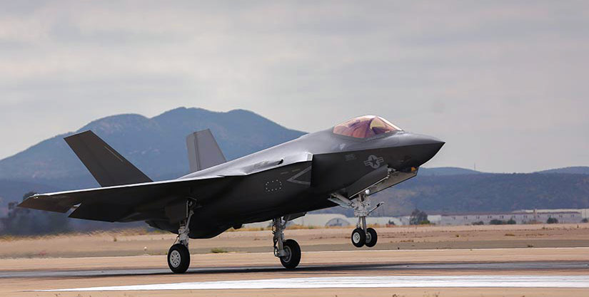 An F35 plane taking off from a runway in Miramar.