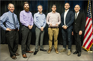 Photo of the six men, including the winning Urban Harvest team from Ryerson University.