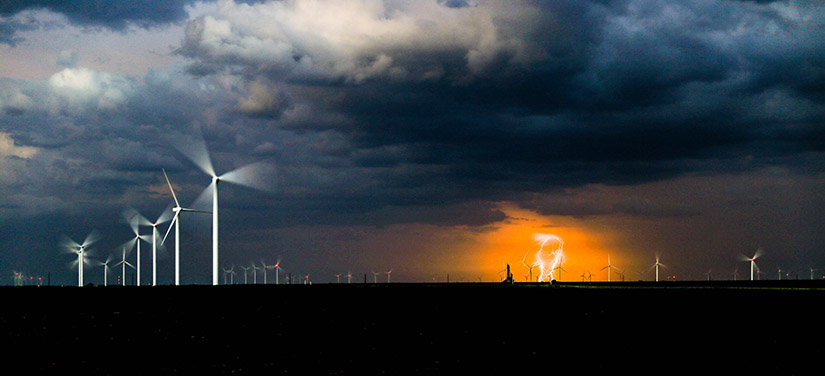 lightning storm over wind turbines