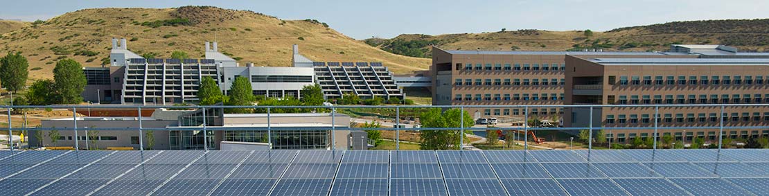 Solar panels line the rooftop of the parking garage at the south table mountain campus of NREL.