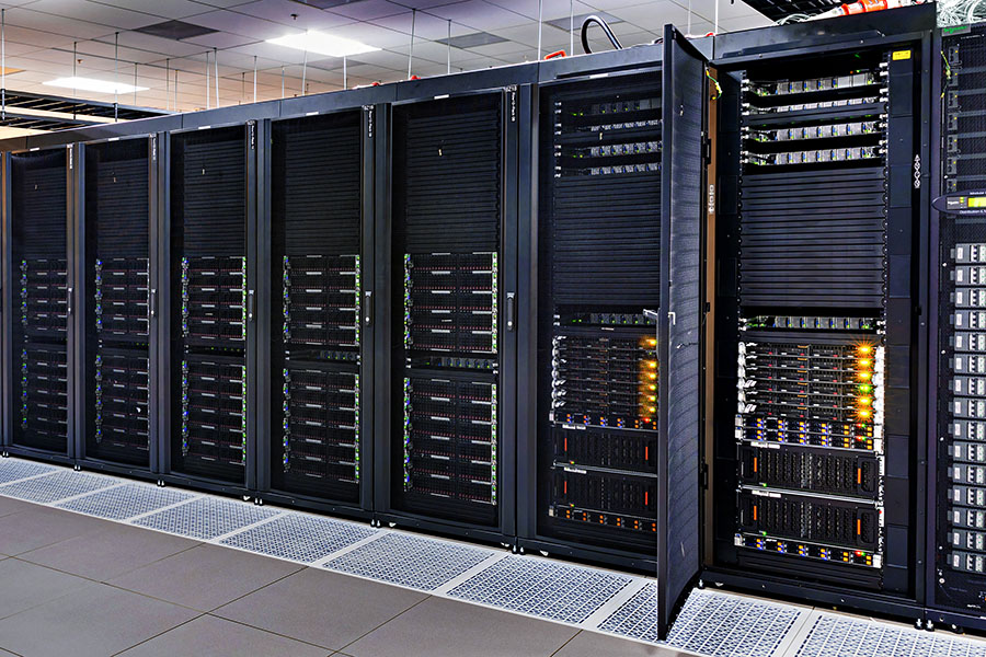 A row of computer server stacks.