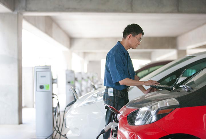 A researcher analyzes data for an electric vehicle plugged into Level 2 electric vehicle supply equipment
