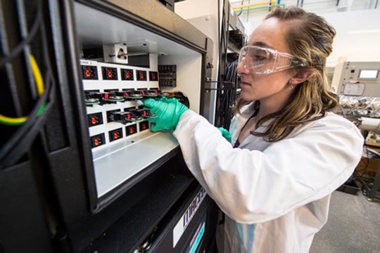 A woman working in a lab.