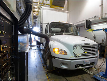 Photo of a heavy-duty truck being driven on a chassis dynamometer.