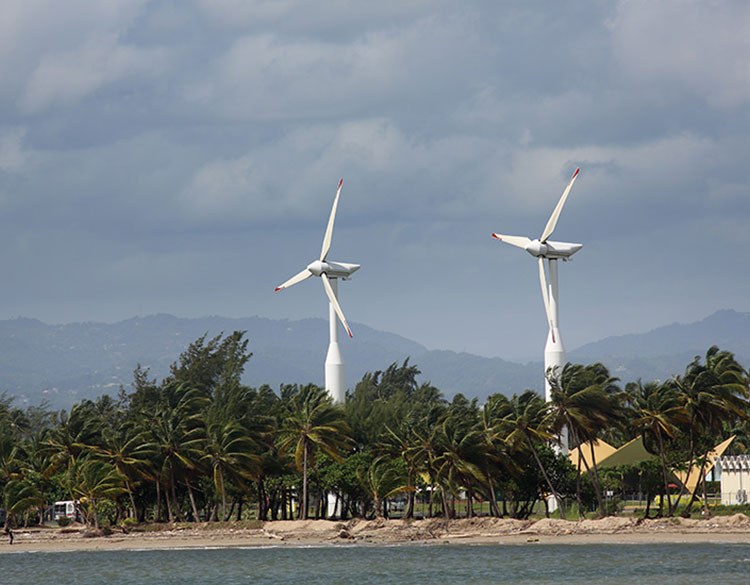 wind turbines on a stormy beach