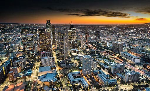 The Los Angeles cityscape at sunset.