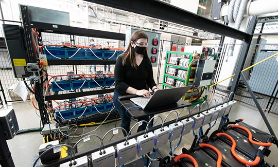 NREL researcher Emma Raszmann works in the Energy Storage Lab.