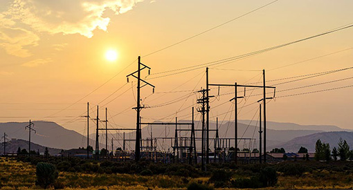 Transmission power lines at sunset