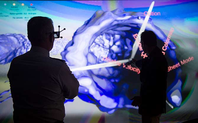 Researcher using visualization tools at NREL.