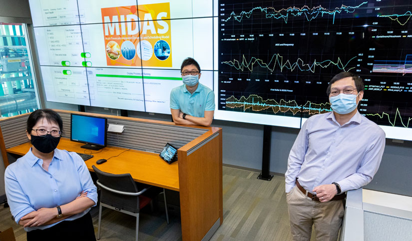 Electrical engineering researchers display images from the Multi-Timescale Integrated Dynamic and Scheduling (MIDAS) software.