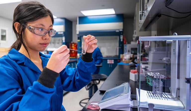 biomass-samples-79698 Researcher in lab.