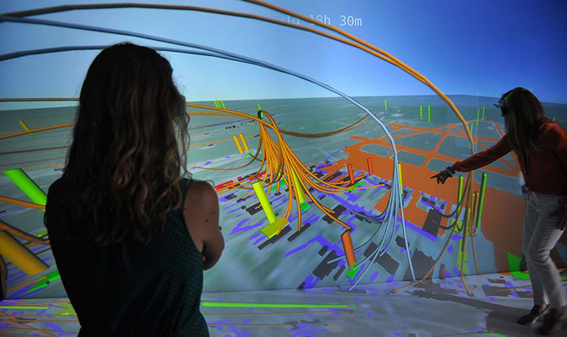 3d-vis-lab-62674 Two researchers look at a 3D model for energy resilience.
