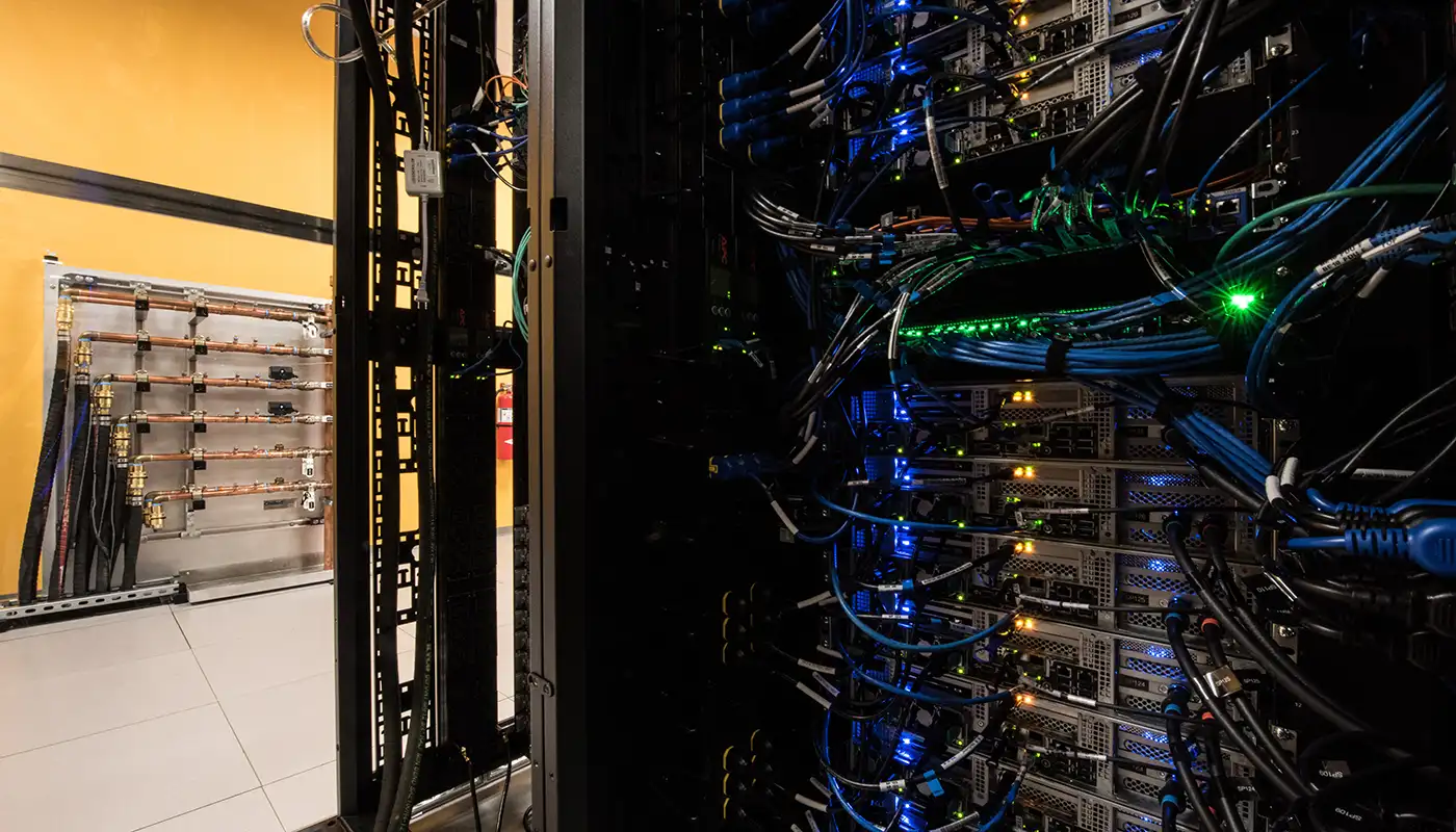 Photo of hot aisle containment manifolds in data center