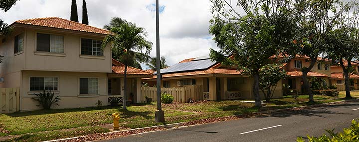 hp-hi-dpv-4295 Photo of a home with a rooftop solar system in a residential neighborhood in Hawaii.