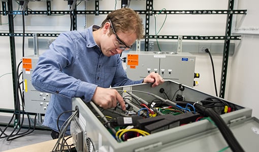 grid-technologies-systems-38620-thumbnail Photo of a researcher in a lab