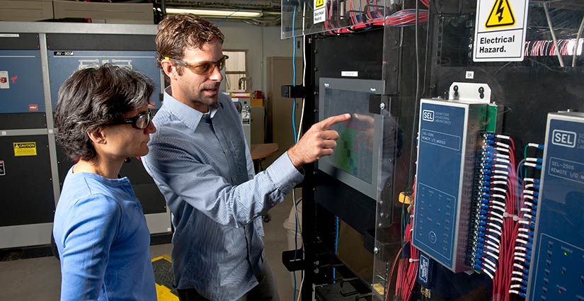 stability-assessment-control-21935 NREL engineers work on data capture for micro-grid synchronization wave forms.
