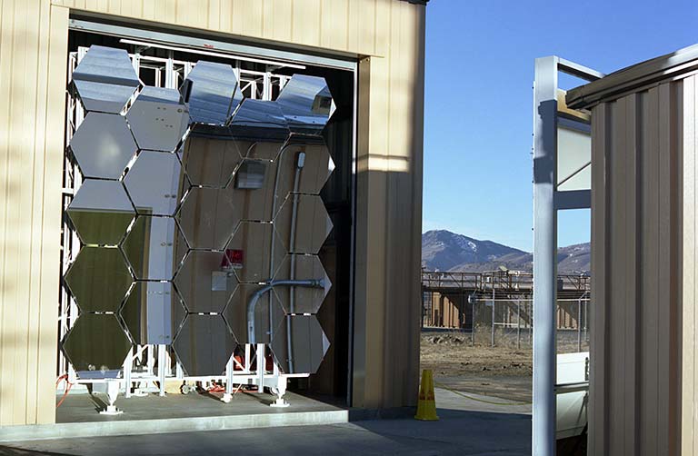 h2_facilities_landing_768x502_00879 Photo of NREL's solar furnace primary concentrator and protection shed.