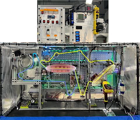 non-evap-float A mechanical set up on a lab bench.