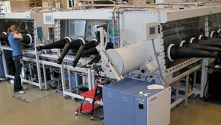 atmospheric_processing_platform Photo of a researcher operating a large piece of lab equipment