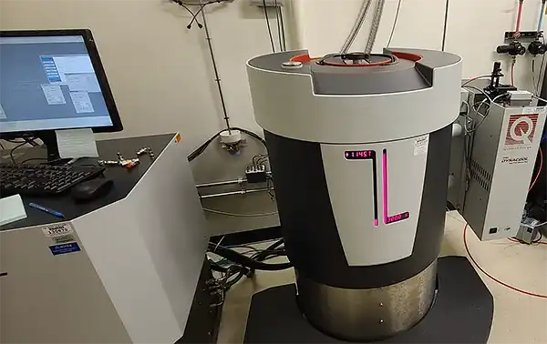 materials-characterization-7 Quantum Design Physical Properties Measurement System connected to a computer with a monitor