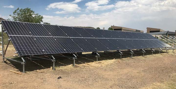 panasonic-installation Photo of a row of solar panels installed at NREL. Panasonic PV Lifetime installation at NREL.