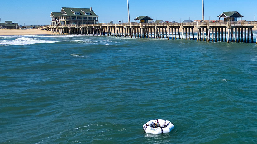 newsletter-winter25-device-deployment Hydraulic and electric wave-powered desalination device that NREL deployed off the coast of North Carolina’s Outer Banks