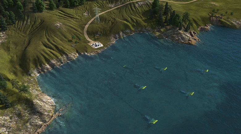 surge-flap-sands Aerial view of ocean shoreline with wave energy devices in the water.