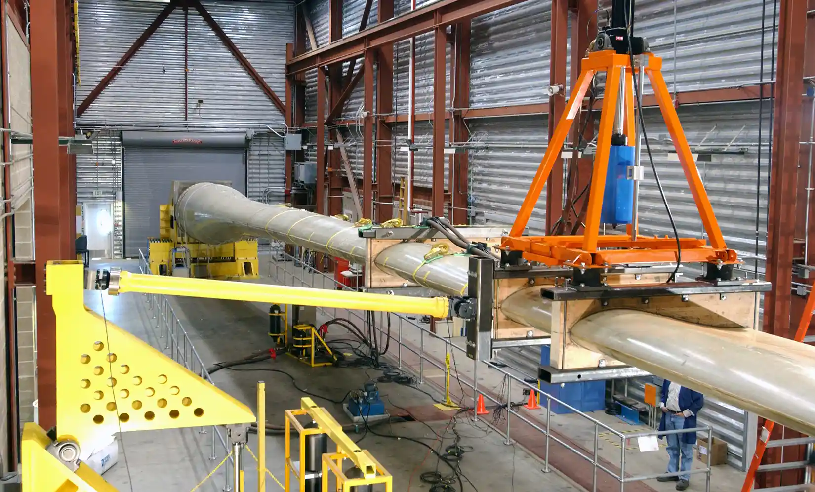 Wind turbine blade being manufactured.
