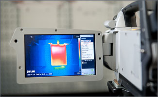 photo_thermal_imaging Photo of a small screen showing a thermal image.