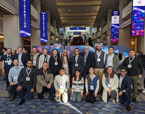 winter24-nrel-trb-2024 Photo of group of people in crowded conference hall.