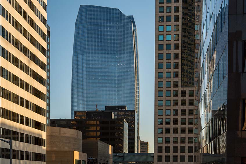 Photo shows skyscrapers in downtown Denver.