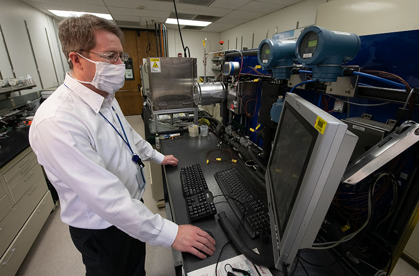 Photo of a researcher working in a lab