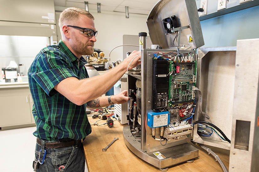 Photo of a man working in a lab