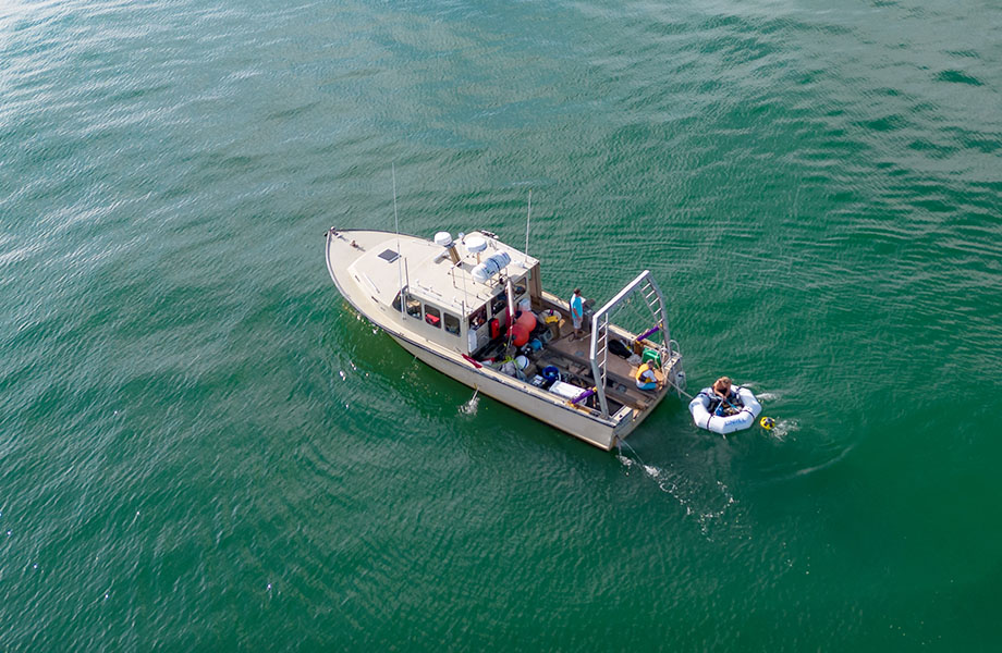Aerial view of the boat and WEC device in the water