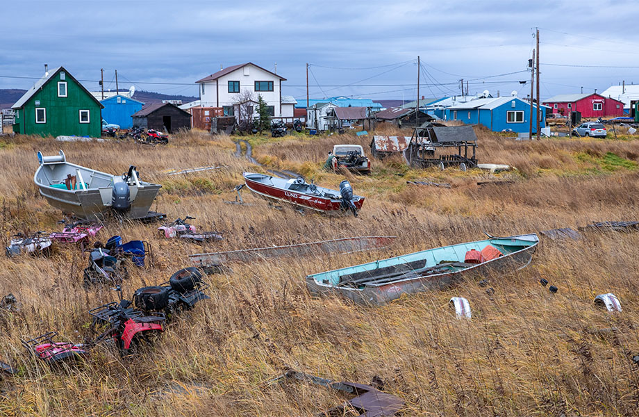 Boats in the marsh in front of houses