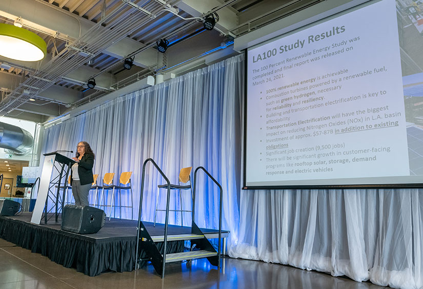 A person presents a slide that reads LA100 Study Results while standing at a podium.