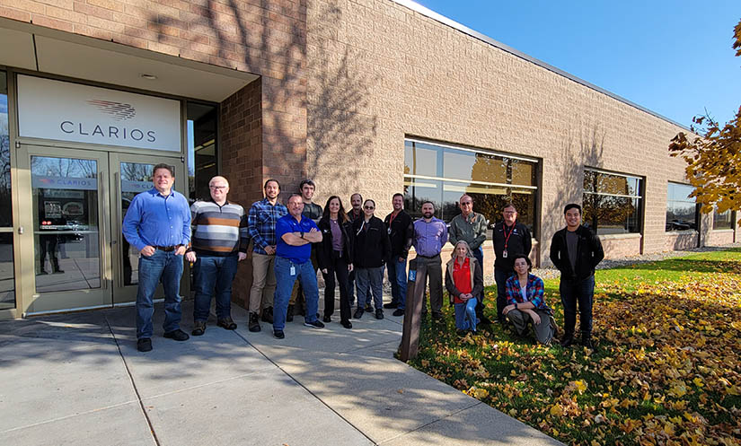 A group of people standing outside a building.