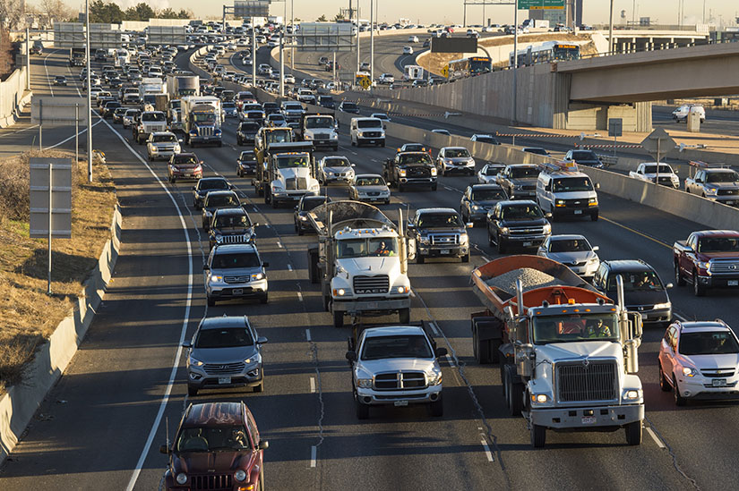 Photo shows traffic congestion on a highway.