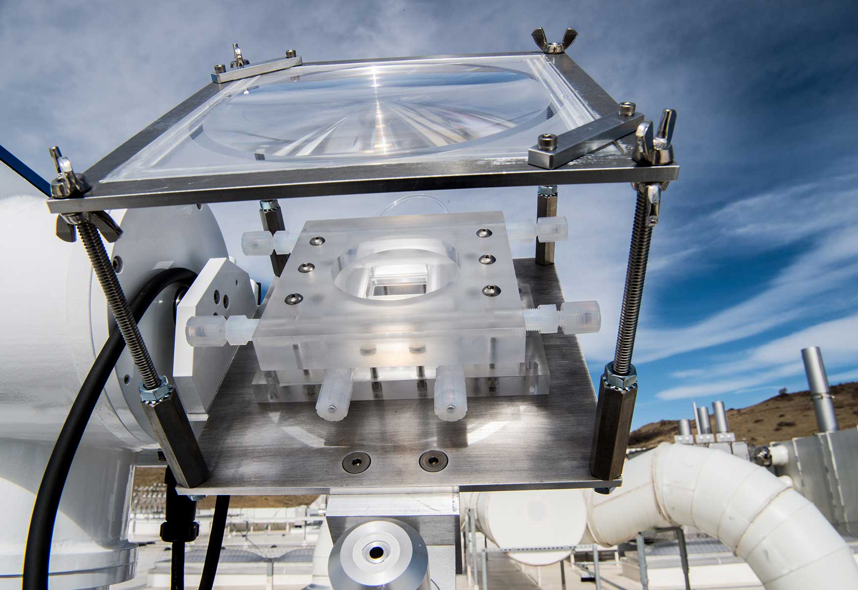 A photoelectrochemical hydrogen production device mounted on a solar tracker on the roof of the Energy Systems Integration Facility. 