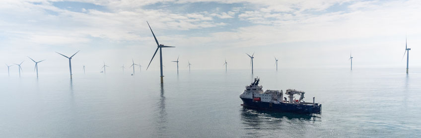 Photo of offshore wind turbines.