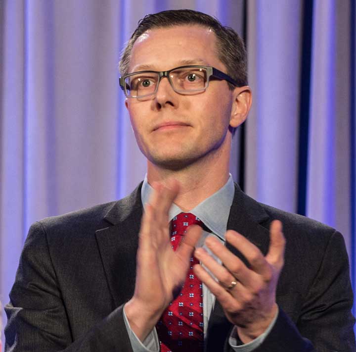 Man speaking into microphone 