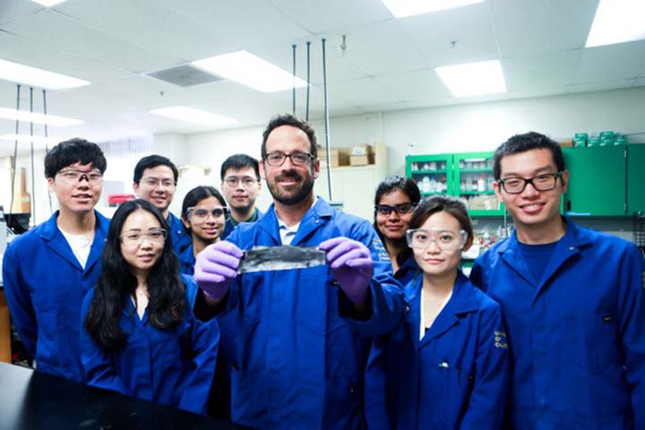 Dr. Jassby and his UCLA team showing the coated membrane partially developed with NREL.