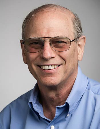 A headshot of Ron Judkoff.