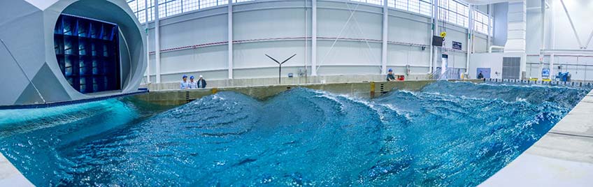 Researchers conduct a wind and wave wind turbine test.