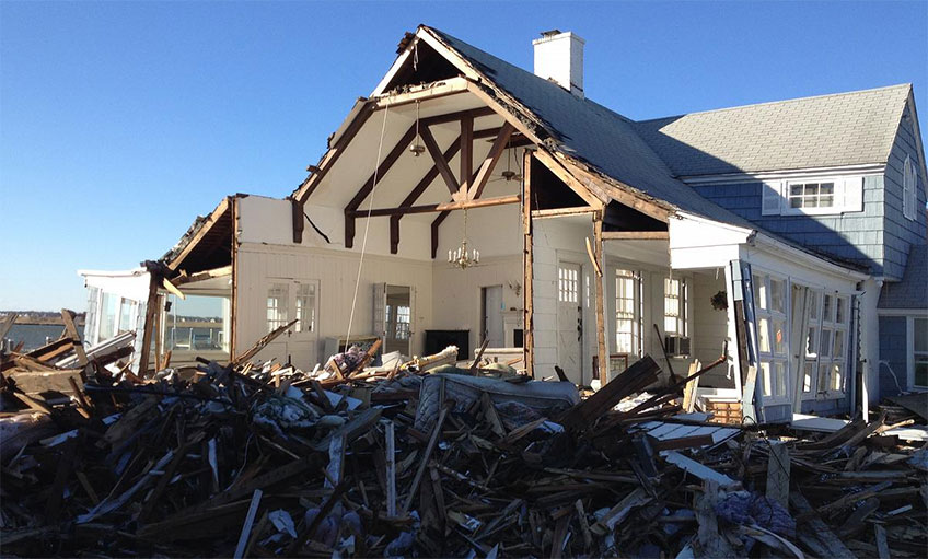 Photo of house with significant hurricane damage