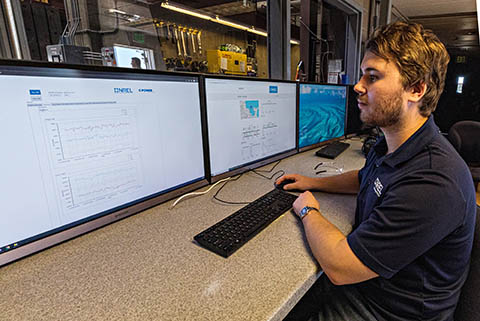 A researcher working on a computer