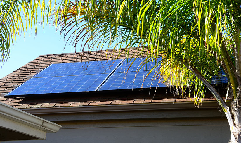 Photo of a solar panel on the roof of a house