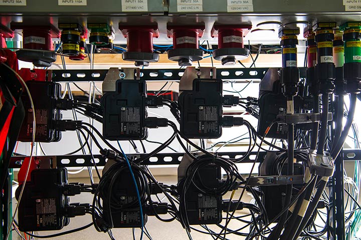 A group of power inverters connected for research.